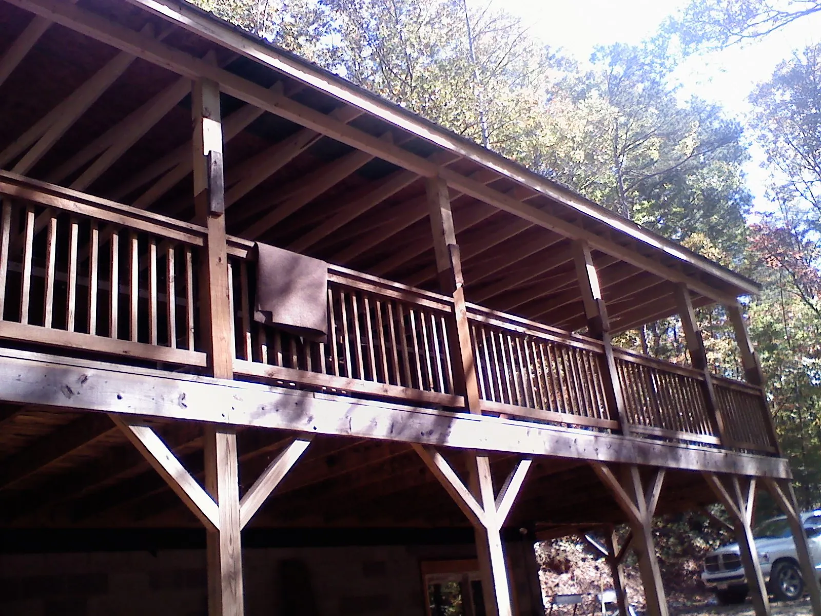 Timber framing under a new elevated porch and deck — Roof Leak Repair in Adams by Roofing Brothers